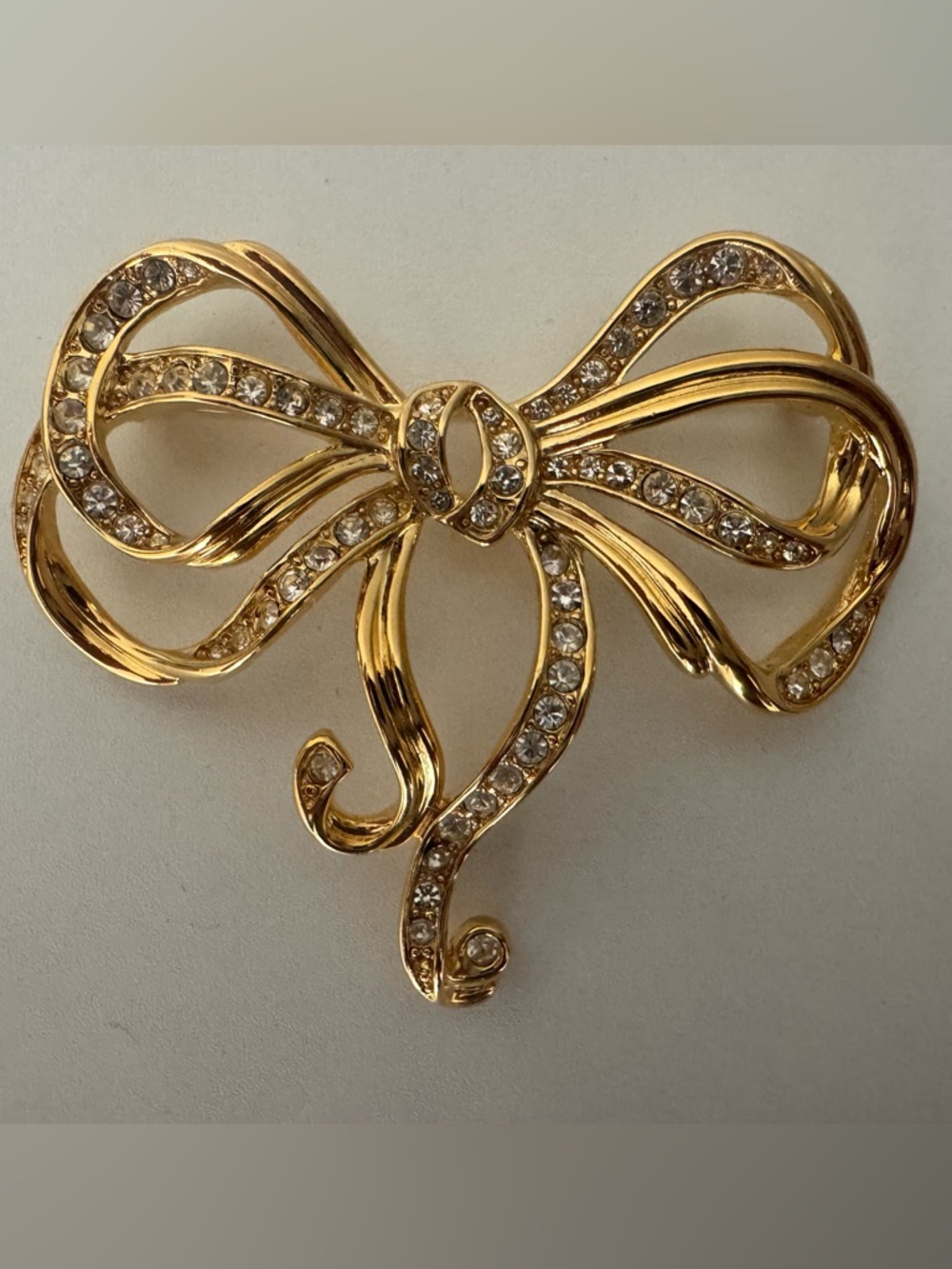 Trifari Gold Bow Brooch with Clear Crystals